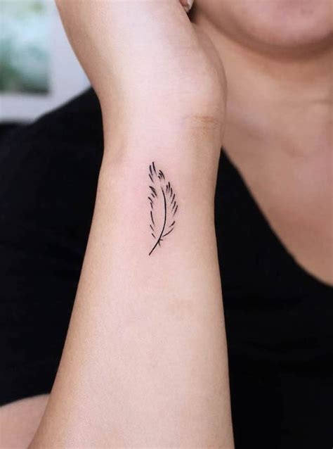 feather tattoo with name inside|52 Beautiful Feather Tattoos with Meaning .
